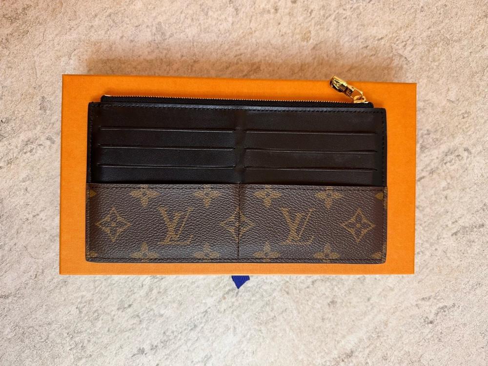 Louis Vuitton Slim purse (M80348) in 2023