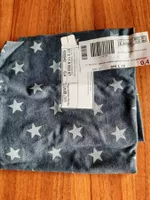 Jerseystoff mit Glitzersternen
