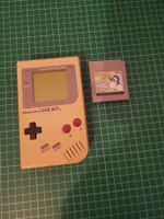 Classic Nintendo Game Boy with Penguin Land game! Retro.
