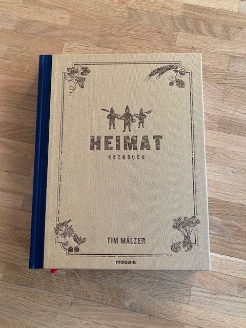 Libri: Tim Mälzer Kochbuch "Heimat" – Nuovo (secondo la descrizione) da Bern venduto da belawoda