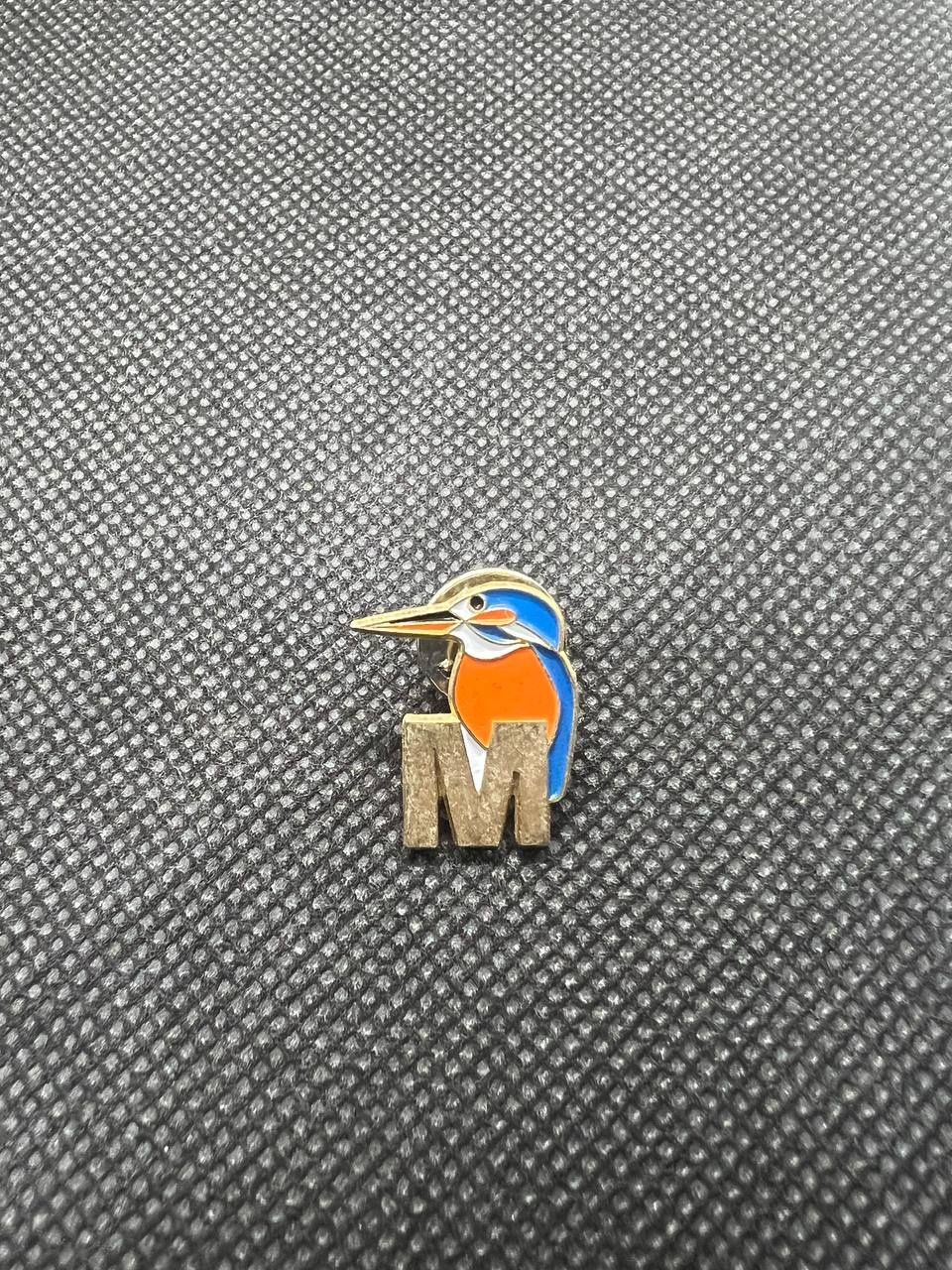 Placchette & Badge: Anstecknadel Migros Eisvogel mit M – Usato da Dietikon venduto da kRizzzZy96