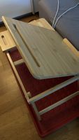 Reading table on bed