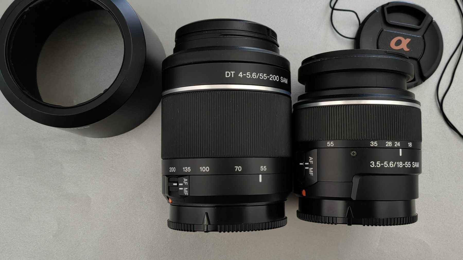 Sony Obiettivi: Sony A-Mount Objektive 18-55mm & 55-200mm – Usato da Weiningen ZH venduto da Schmacki