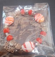 Bracelet fantaisie pierres et breloques 