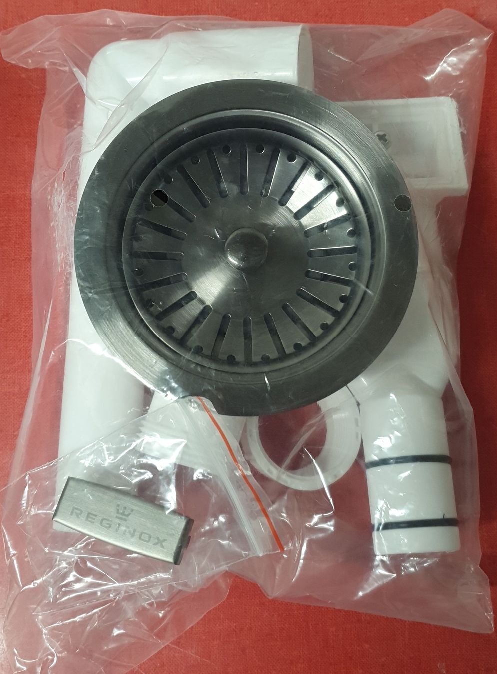 Armaturen: Reginox Ablaufgarnitur – Neu und originalverpackt aus Kehrsatz von Eifach-Luege-ch
