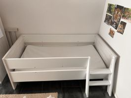 2-in-1 Babybett und Kinderbett von Paidi mit viel Zubehör