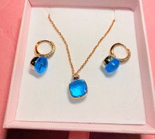 Joli ensemble collier et boucles d'oreilles Bleus