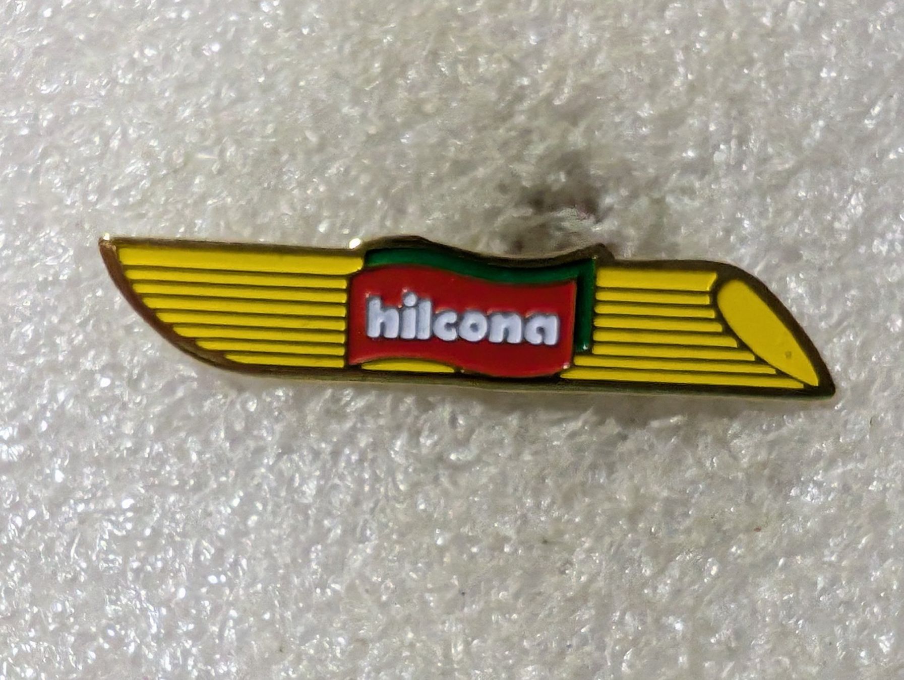 Placchette & Badge: Ansteckpin 147: hilcona – Usato da Oppligen venduto da Pin-Fall-Shop