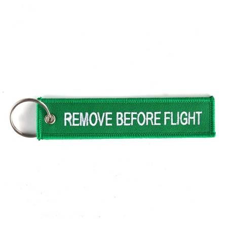 Portachiavi: Schlüsselanhänger REMOVE BEFORE FLIGHT grün – Nuovo e nell'imballaggio originale da Bern venduto da aeroshop.ch