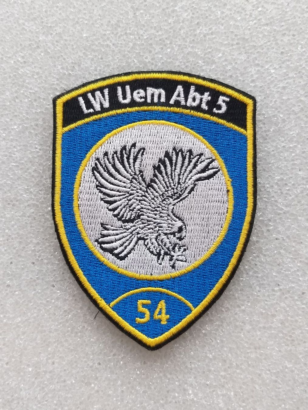 Placchette & Badge: Verbandsabzeichen LW Uem Abt 5-54 V1 – Usato da Bauma venduto da SwissMilitaria