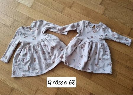 2 Kinderkleider beige mit Tiermotiv