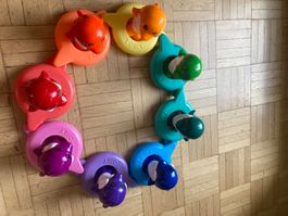 Tomy Delfin Wasserspielzeug farbig 8 teilig guter Zustand
