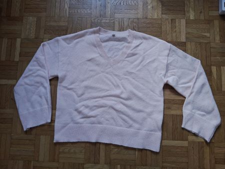 Pull rose col en V coupe large taille S