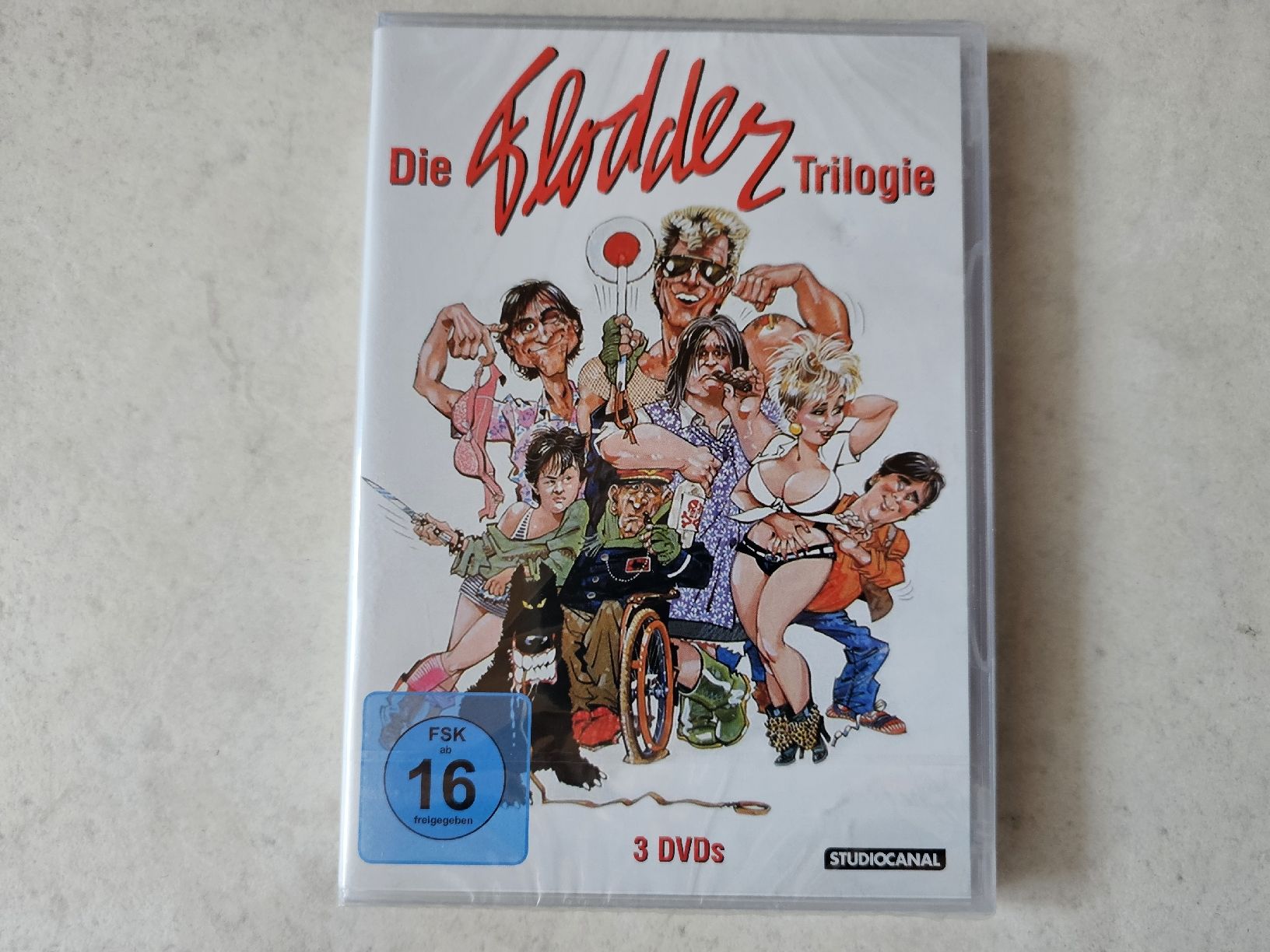 Tutti i DVDs: Die Flodder Trilogie  /  3 DVD Set Fabrikneu – Nuovo e nell'imballaggio originale da Schneisingen venduto da backstore24