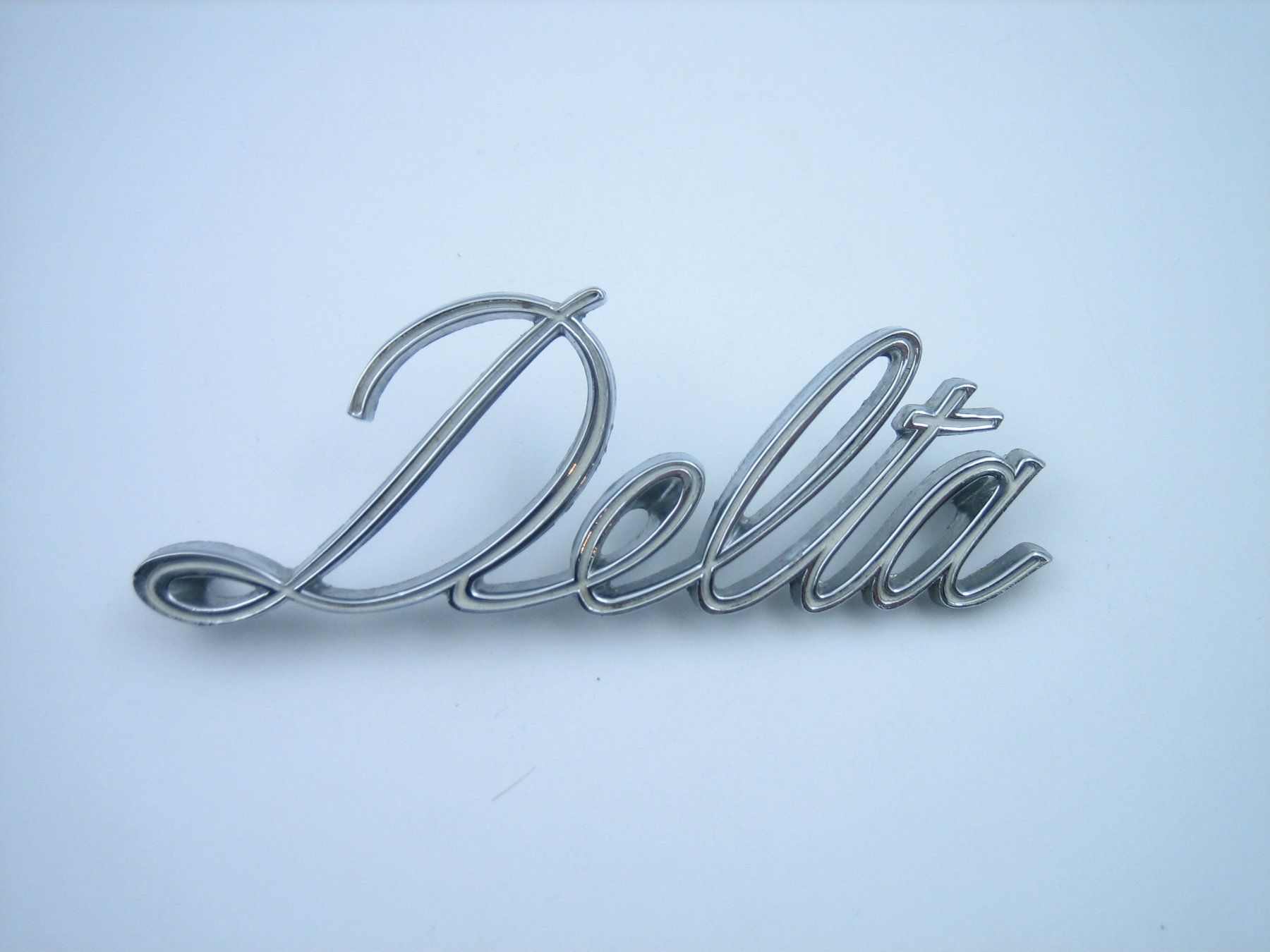 Oldsmobile Tutti pezzi di ricambio auto: Oldsmobile altes Autoemblem – Usato da Zürich venduto da Tomi118