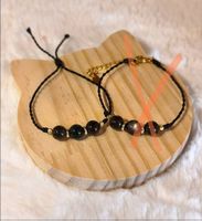 Bracelet fait main en  obsidienne et quartz fumé macramé 
