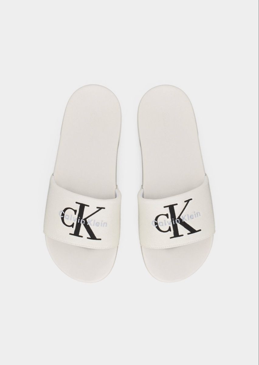 Calvin Klein Scarpe da uomo: Calvin Klein Mules - triple bright white pointure 41 – Nuovo e nell'imballaggio originale da Urtenen-Schönbühl venduto da Big.sanad