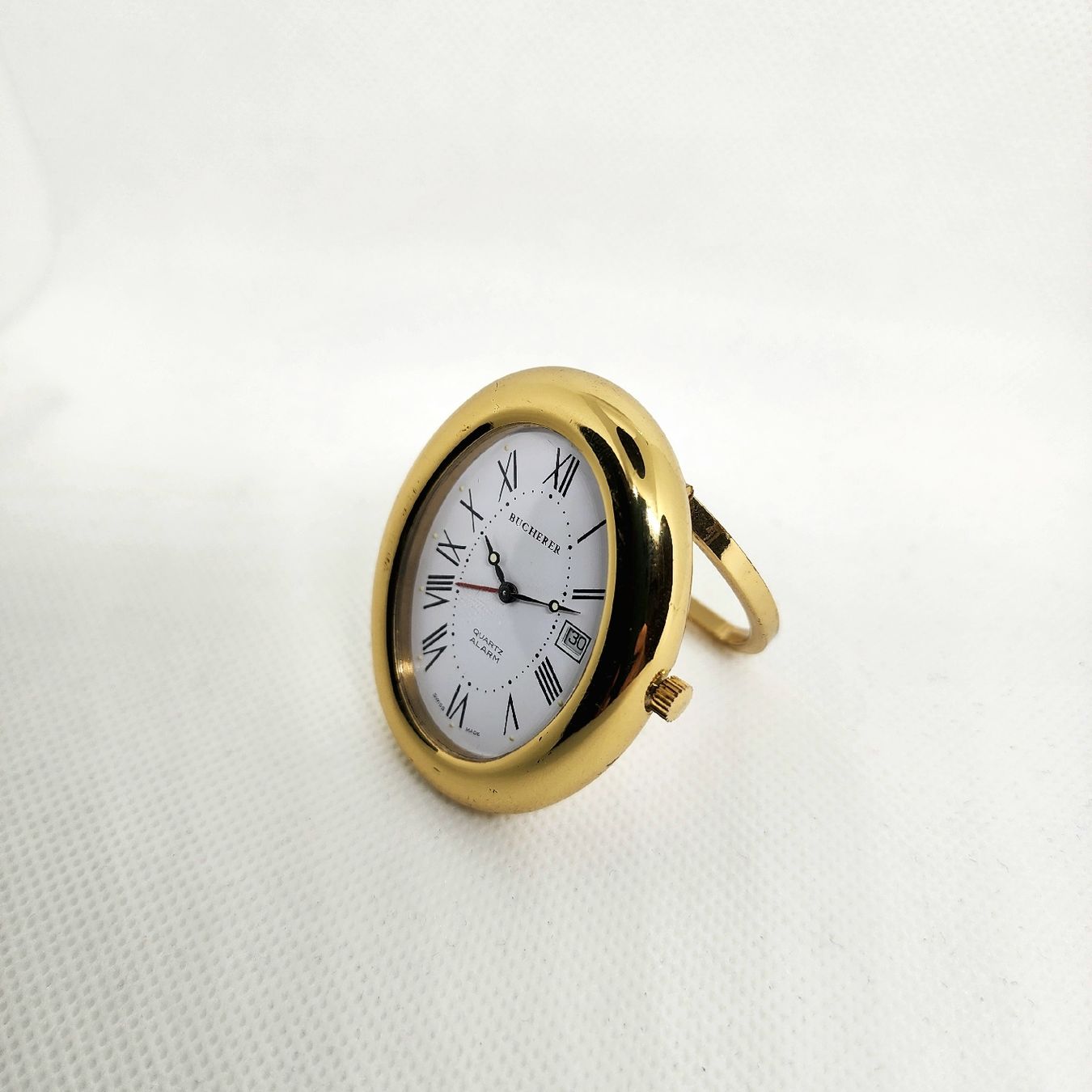 Bucherer Sveglie: Pendulette Bucherer quartz avec étui – Usato da Vevey venduto da var_5d8n 2