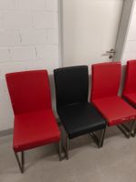 6 Freischwinger Stühle (3x Rot, 3x Schwarz) –Edelstahlrahmen