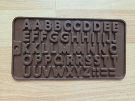 Buchstabenform Schokoladenform Alphabet