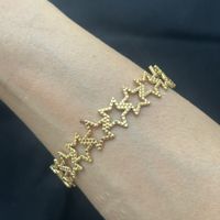 Goldene Stern Armreif aus Edelstahl 