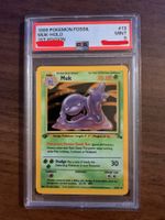 Pokémon 1 Edition MUK Holo  PSA 9 | Englisch