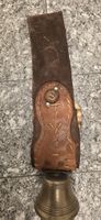 Glocke Rigotti mit Riemen 1946 mit klassischer Sechserrose