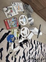 Nintendo Wii Komplettset – 2 Controller, 4 Nunchucks, Spiele