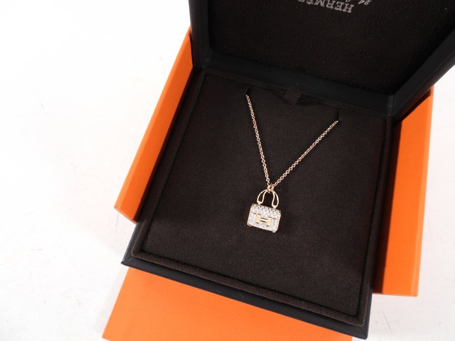 Hermès Catenine: Hermes constance amulettes neu – Nuovo e nell'imballaggio originale da Kilchberg ZH venduto da cruella 1
