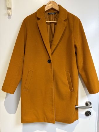 Un manteau était acheté au Japon M