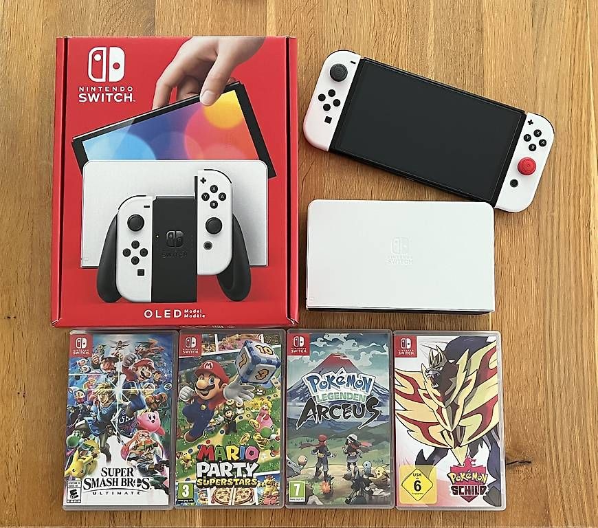 Nintendo Konsolen: Switch OLED mit 4 Games Neuwertig – Neu (gemäss Beschreibung) aus St. Gallen von AOCards