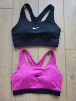 Set von 2 Nike Sport Tops (BHs) Pink Schwarz Grösse S