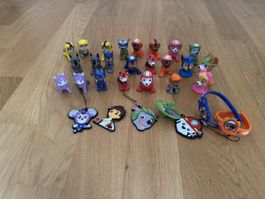 Diverse kleine Paw Patrol Spielfiguren und Anhänger