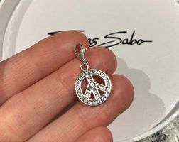 Thomas Sabo Charm Peace mit Zirkonia ☮️ Silber 925 💎