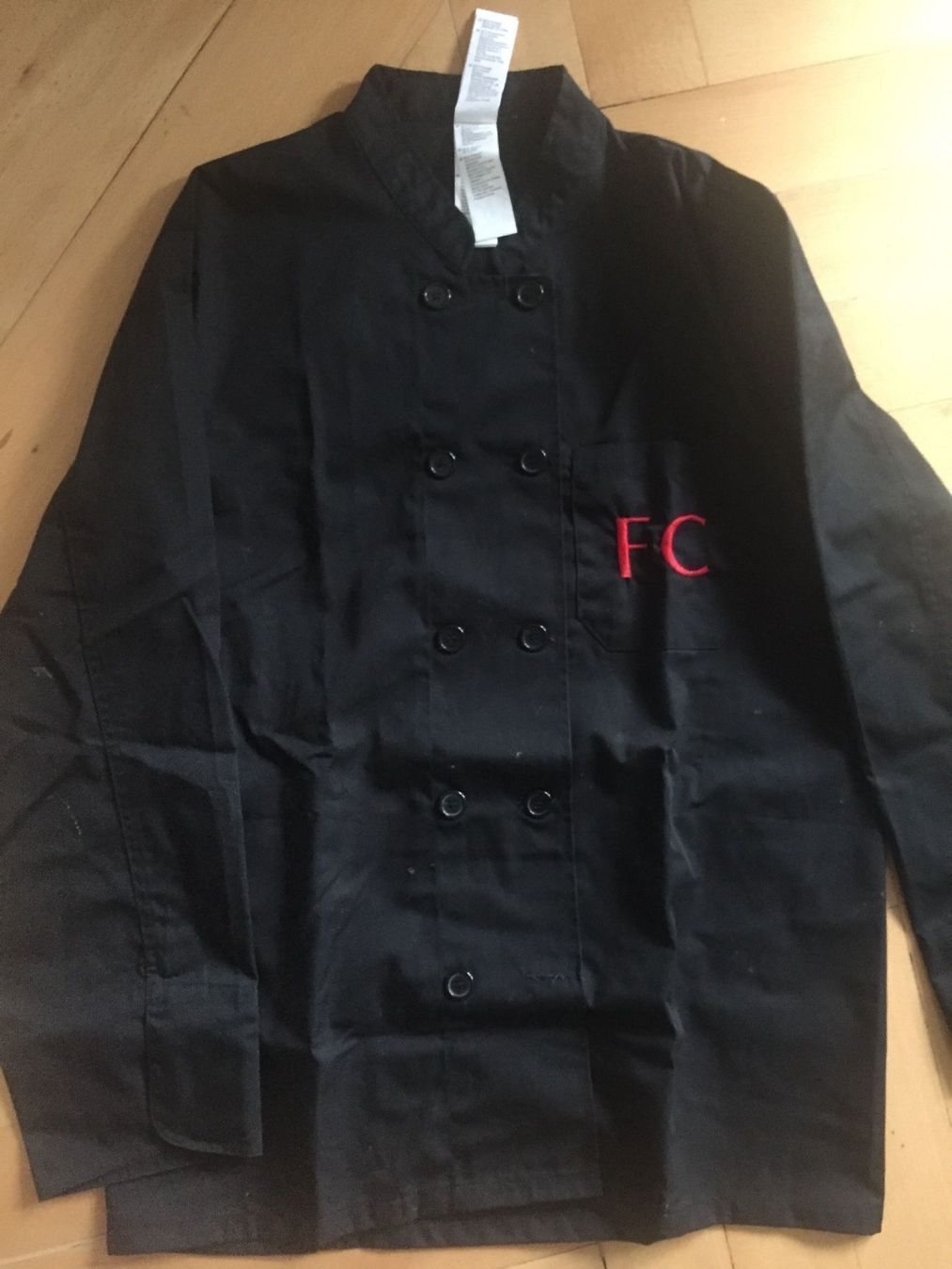 Uniformi: Veste tablier chef noire initiales FC – Nuovo (secondo la descrizione) da Küssnacht am Rigi venduto da FFKA