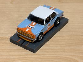 Auto World X-Traction Datsun Bre 510 "Gulf" neu