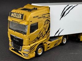 MAN Sattelzug Golden Commander Müller Herpa 1:87 Schlütter