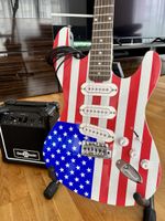 E-Gitarre mit Verstärker und Ständer