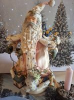 ÄLTERER ANTIKER WEIHNACHTSMANN MIT  MESSINGKERZENHALTER
