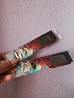 2 paires lunettes éclipse.