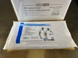 250x Latzschürze mit Bändern,  Hygostar, PE 60 my geblockt