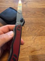 Victorinox Jagdmesser mit Klingensaege, Rot/Schwarz 55 Ze...