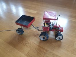Blech-Traktor mit Abhänger aus Afrika