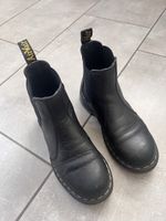 Gut erhaltene Doc Martens aus schwarzem Leder