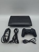 PS3 Slim noire, avec manette et câbles - Prête à jouer !