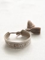 Schönes Armband "Love" in beige weiss