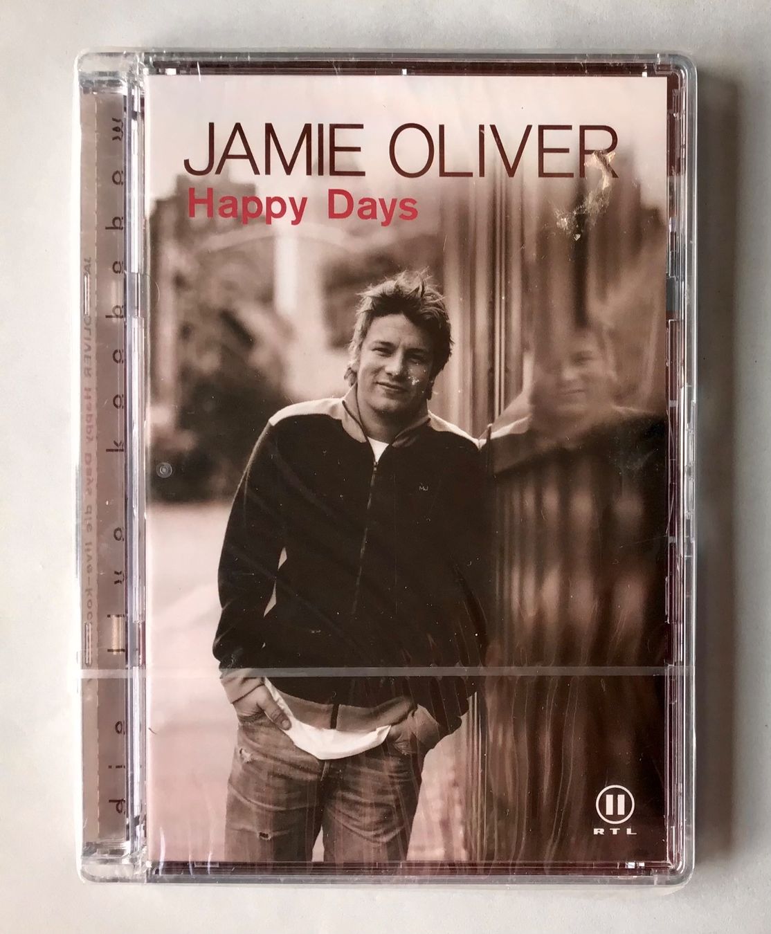 Tutti i DVDs: Jamie Oliver - Happy Days DVD - Kochsendung – Nuovo e nell'imballaggio originale da Bubendorf venduto da Alpenheidi