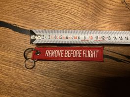 Schlüsselanhänger REMOVE BEFORE FLIGHT