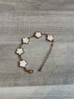 Bracelet femme avec motifs en trèfles
