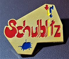 Q856 - Pin Schulblitz  /  Nr. 203